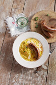 Saffron risotto with luganighe and parmesan