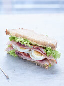 Club sandwich with ham and egg