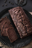 Chocolate banana bread on a black serving plate