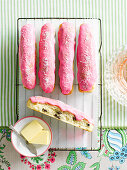 Sweet yeast sticks with pink icing