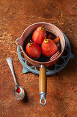 Pears in red wine with cinnamon