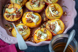 Baked peaches with feta, walnuts and honey