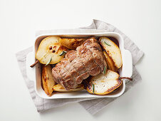Veal roll roast with pears in port wine sauce