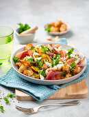 Simple Italian bread salad with tomatoes and peaches