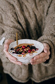 Blueberry-cranberry porridge with honey and peanut butter