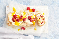 Brown sugar meringue roll with lemon curd and raspberries