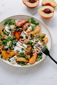 Burrata with nectarines, pumpkin seeds, balsamic vinegar and mint