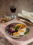 Roasted poulard breasts from the tray with red cabbage