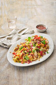 Oriental autumn pilaf with chicken and cashew nuts