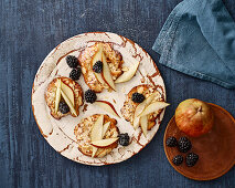 Bostock tartlets with miso almond cream, pears and blackberries