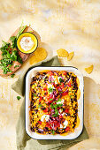 Oven-baked nachos with black beans and sweetcorn