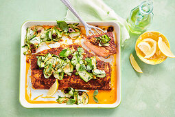 Salmon from the tray with fresh courgettes