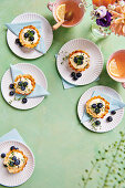 Lemon tartlets with blueberries