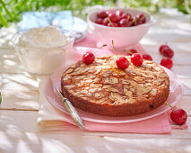 Cherry cake with almonds, cut into pieces