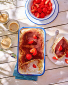 Tiramisu with strawberries and verbena in moulds