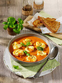 Cream of tomato soup with tortellini