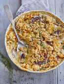 Celery and potato gratin with oat and herb crust and mountain cheese