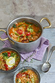 Savoy cabbage and cereal stew with sour cream