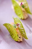 Amuse bouche with smoked eel and lime waffles