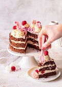 Naked cake with raspberries