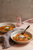 Vegetarian lasagne soup with tomato sauce and red lentils