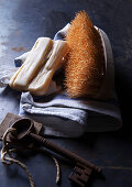 Still life with Marseille soap, brush and cotton apron