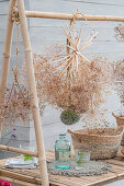 Yarrow flowers (Achillea), ornamental leeks (Allium) and poppy capsules drying