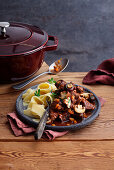 Oven goulash with mushrooms and pappardelle
