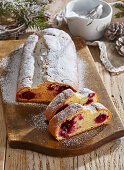 Black Forest stollen with cherries and icing sugar