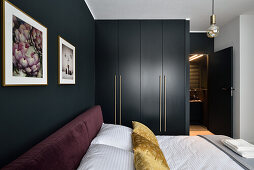 Modern bedroom design in two-room flat in Natolin, Warsaw