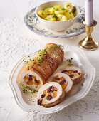 Stuffed turkey roll with pumpkin and cranberries