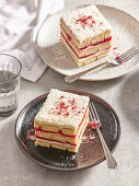 Raspberry tiramisu with white chocolate and coconut flakes