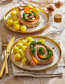 Bratwurstschnecke mit Gemüse und Kartoffeln