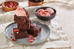 Brownies with red beans, strawberry ice cream and chocolate icing