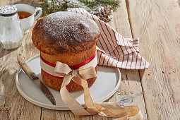 Panettone with candied fruit and icing sugar