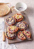 Round yeast dough cake with plums and crumble