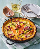 Carrot quiche with pancetta and spring onions