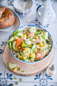 Greek salad with egg, smoked salmon and iceberg lettuce