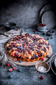 Yeast cake with blueberries and cranberries