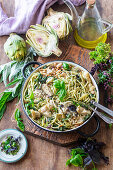 Artichoke pasta with white beans, pesto and pine nuts