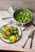 Green Königsberg meatballs with crushed potatoes