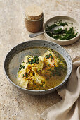 Hearty beef broth with potato dumplings