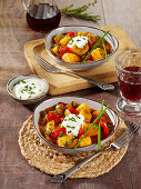 Vegetarian potato goulash with peppers and yoghurt