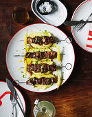 Grilled chicken liver skewers on Andean Sunrise mashed potatoes