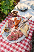 Raw meat, poultry and sausages for grilling