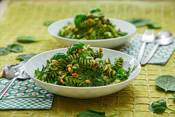 Pasta with spinach pesto and pine nuts