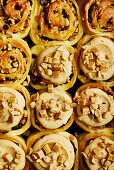 Peanut rolls with peanut cream topping