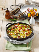 Asparagus frittata with potatoes, courgettes and mozzarella