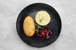 Kiev chop with mashed potatoes and beetroot salad