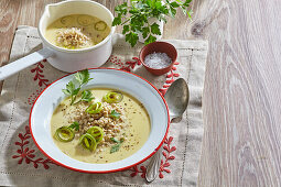 Creamy pearl barley soup with leek and parsley